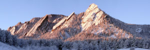 picture of boulder flatirons - winter sun