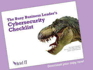 Cover of a marketing flyer: 'The Busy Business Leader's Cybersecurity Checklist' with a roaring dinosaur on a white background and purple accents (Ariel IT).